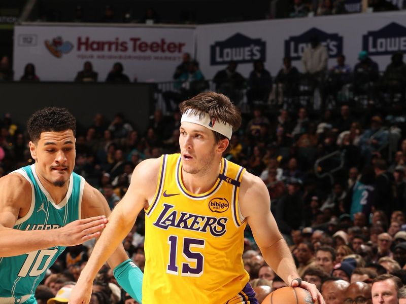 CHARLOTTE, NC - JANUARY 27: Austin Reaves #15 of the Los Angeles Lakers dribbles the ball during the game against the Charlotte Hornets  on January 27, 2025 at Spectrum Center in Charlotte, North Carolina. NOTE TO USER: User expressly acknowledges and agrees that, by downloading and or using this photograph, User is consenting to the terms and conditions of the Getty Images License Agreement. Mandatory Copyright Notice: Copyright 2025 NBAE (Photo by Kent Smith/NBAE via Getty Images)