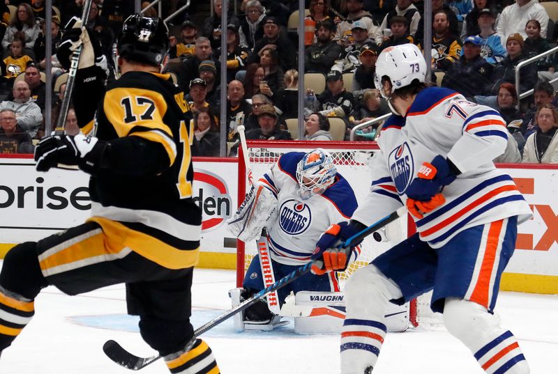 Mar 10, 2024; Pittsburgh, Pennsylvania, USA;  Edmonton Oilers goaltender Calvin Pickard (30) makes a save against Pittsburgh Penguins right wing Bryan Rust (17) during the first period at PPG Paints Arena. Mandatory Credit: Charles LeClaire-USA TODAY Sports