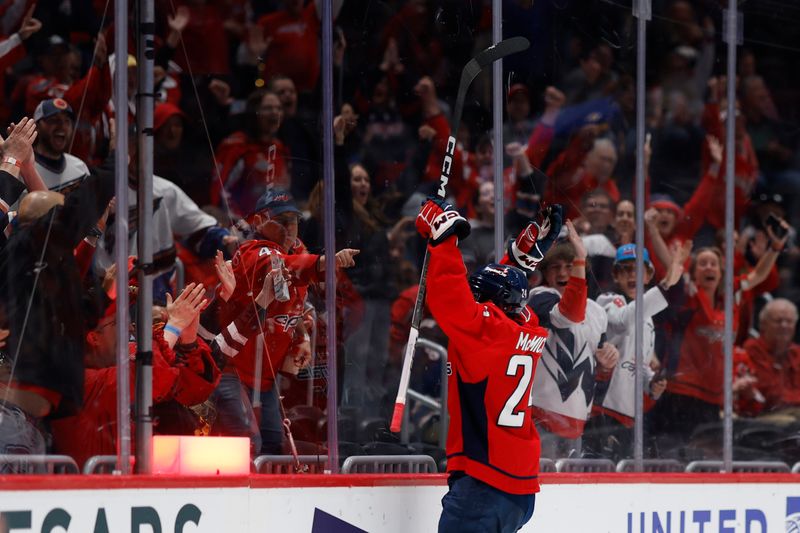 Oct 31, 2024; Washington, District of Columbia, USA; Washington Capitals center Connor McMichael (24) celebrates after scoring a goal against the Montreal Canadiens in the third period at Capital One Arena. Mandatory Credit: Geoff Burke-Imagn Images