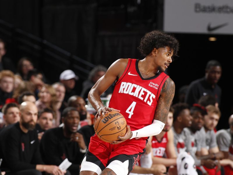 PORTLAND, OR - MARCH 8:  Jalen Green #4 of the Houston Rockets handles the ball during the game  on March 8, 2024 at the Moda Center Arena in Portland, Oregon. NOTE TO USER: User expressly acknowledges and agrees that, by downloading and or using this photograph, user is consenting to the terms and conditions of the Getty Images License Agreement. Mandatory Copyright Notice: Copyright 2024 NBAE (Photo by Cameron Browne/NBAE via Getty Images)