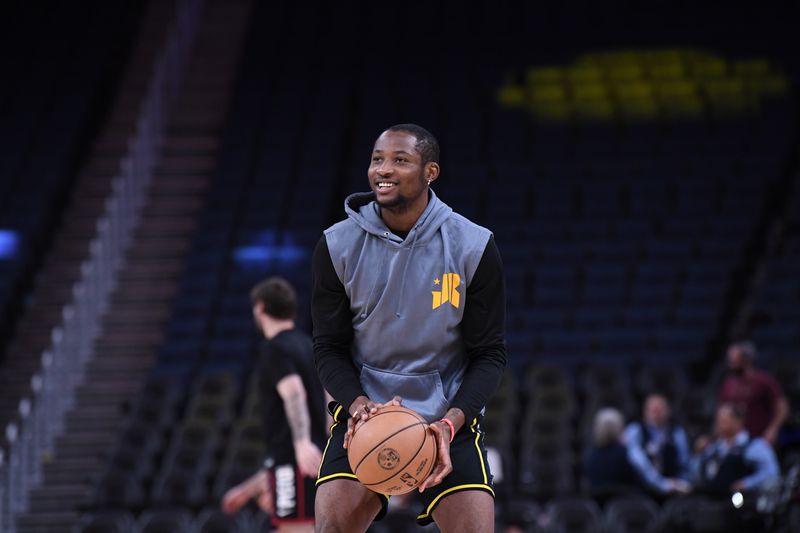 SAN FRANCISCO, CA - JANUARY 5: Jonathan Kuminga #00 of the Golden State Warriors warms up before the game against the Detroit Pistons on January 5, 2024 at Chase Center in San Francisco, California. NOTE TO USER: User expressly acknowledges and agrees that, by downloading and or using this photograph, user is consenting to the terms and conditions of Getty Images License Agreement. Mandatory Copyright Notice: Copyright 2024 NBAE (Photo by Noah Graham/NBAE via Getty Images)