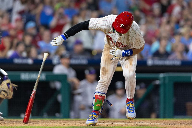 Apr 15, 2024; Philadelphia, Pennsylvania, USA; Philadelphia Phillies first base Bryce Harper (42) slams his bat after popping out during the eighth inning against the Colorado Rockies at Citizens Bank Park. Mandatory Credit: Bill Streicher-USA TODAY Sports