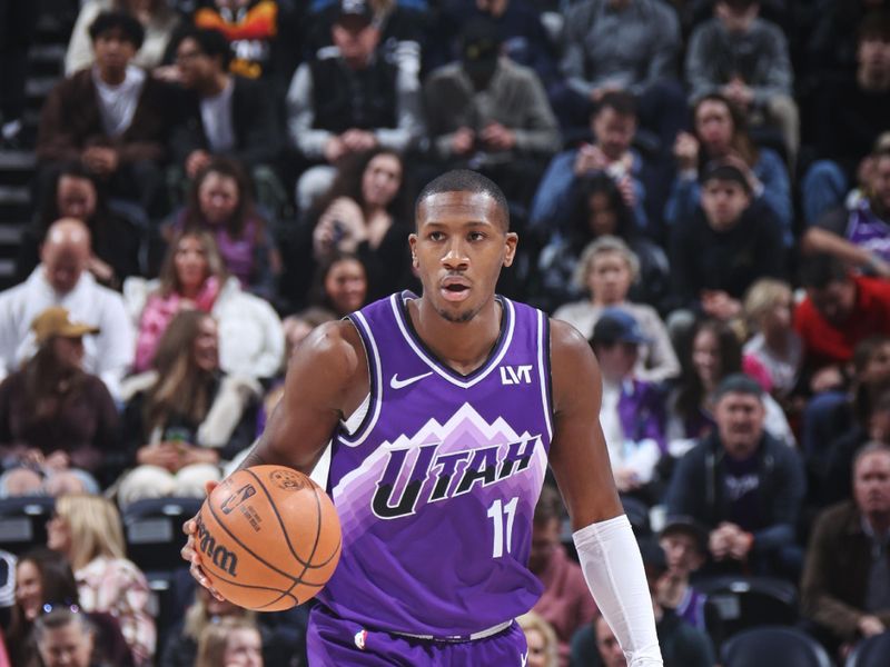 SALT LAKE CITY, UT - FEBRUARY 6: Kris Dunn #11 of the Utah Jazz dribbles the ball during the game against the Oklahoma City Thunder on February 6, 2024 at Delta Center in Salt Lake City, Utah. NOTE TO USER: User expressly acknowledges and agrees that, by downloading and or using this Photograph, User is consenting to the terms and conditions of the Getty Images License Agreement. Mandatory Copyright Notice: Copyright 2024 NBAE (Photo by Melissa Majchrzak/NBAE via Getty Images)