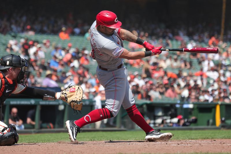 Aug 30, 2023; San Francisco, California, USA; Cincinnati Reds first baseman Christian Encarnacion-Strand (33) hits an rbi single during the sixth inning against the San Francisco Giants at Oracle Park. Mandatory Credit: Sergio Estrada-USA TODAY Sports