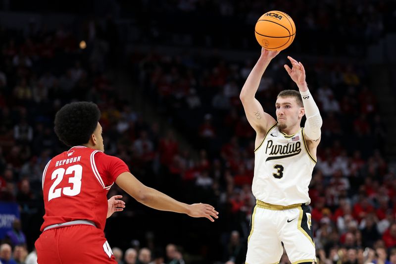 Mar 16, 2024; Minneapolis, MN, USA; Purdue Boilermakers guard Braden Smith (3) shoots as Wisconsin Badgers guard Chucky Hepburn (23) defends during the first half at Target Center. Mandatory Credit: Matt Krohn-USA TODAY Sports