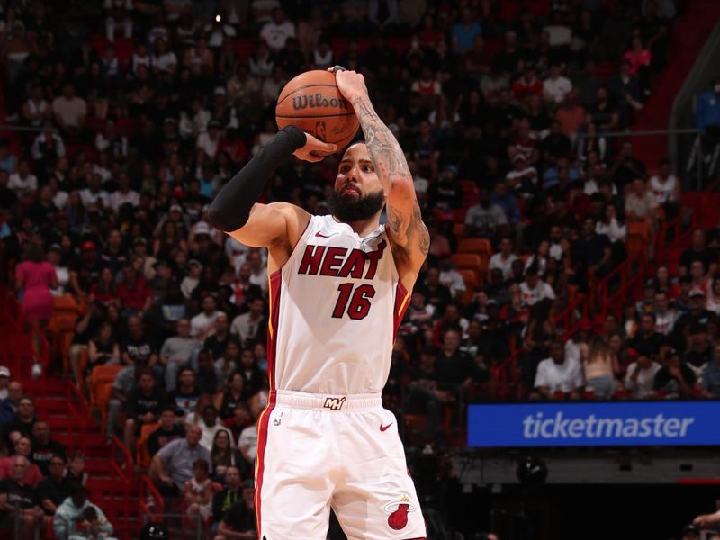 MIAMI, FL - APRIL 19: Caleb Martin #16 of the Miami Heat shoots a three point basket during the game against the Chicago Bulls during the 2024 Play-In Tournament on April 19, 2024 at Kaseya Center in Miami, Florida. NOTE TO USER: User expressly acknowledges and agrees that, by downloading and or using this Photograph, user is consenting to the terms and conditions of the Getty Images License Agreement. Mandatory Copyright Notice: Copyright 2024 NBAE (Photo by Issac Baldizon/NBAE via Getty Images)