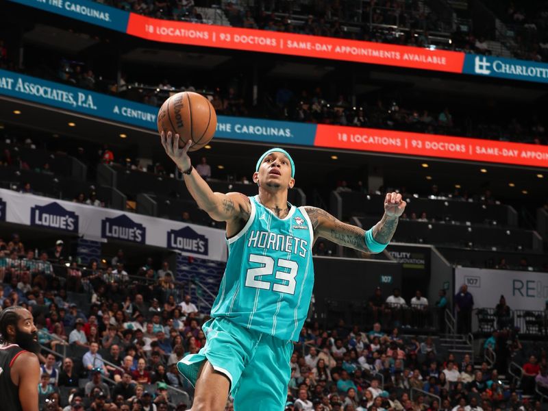 CHARLOTTE, NC - MARCH 31: Tre Mann #23 of the Charlotte Hornets shoots the ball during the game against the LA Clippers on March 31, 2024 at Spectrum Center in Charlotte, North Carolina. NOTE TO USER: User expressly acknowledges and agrees that, by downloading and or using this photograph, User is consenting to the terms and conditions of the Getty Images License Agreement. Mandatory Copyright Notice: Copyright 2024 NBAE (Photo by Kent Smith/NBAE via Getty Images)