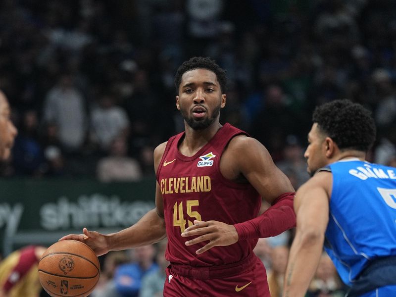 DALLAS, TX - JANUARY 03:  Donovan Mitchell #45 of the Cleveland Cavaliers dribbles the ball during the game against the Dallas Mavericks on January 3, 2025 at American Airlines Center in Dallas, Texas. NOTE TO USER: User expressly acknowledges and agrees that, by downloading and or using this photograph, User is consenting to the terms and conditions of the Getty Images License Agreement. Mandatory Copyright Notice: Copyright 2025 NBAE (Photo by Glenn James/NBAE via Getty Images)