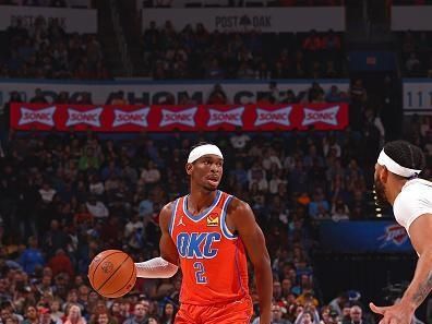 OKLAHOMA CITY, OK - DECEMBER 23: Shai Gilgeous-Alexander #2 of the Oklahoma City Thunder looks on during the game against the Los Angeles Lakers on December 23, 2023 at Paycom Arena in Oklahoma City, Oklahoma. NOTE TO USER: User expressly acknowledges and agrees that, by downloading and or using this photograph, User is consenting to the terms and conditions of the Getty Images License Agreement. Mandatory Copyright Notice: Copyright 2023 NBAE (Photo by Zach Beeker/NBAE via Getty Images)