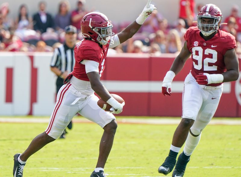 Sep 11, 2021; Tuscaloosa, Alabama, USA; Alabama Crimson Tide defensive back Kool-Aid McKinstry (1) reacts after he intercepted the ball against Mercer Bears at Bryant-Denny Stadium. Mandatory Credit: Marvin Gentry-USA TODAY Sports