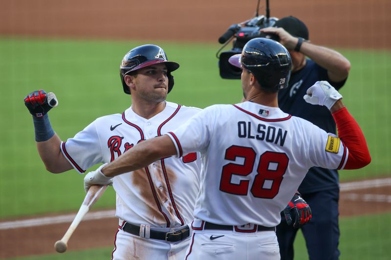 Jun 27, 2023; Atlanta, Georgia, USA; Atlanta Braves third baseman Austin Riley (27) celebrates with first baseman Matt Olson (28) after a home run against the Minnesota Twins in the first inning at Truist Park. Mandatory Credit: Brett Davis-USA TODAY Sports