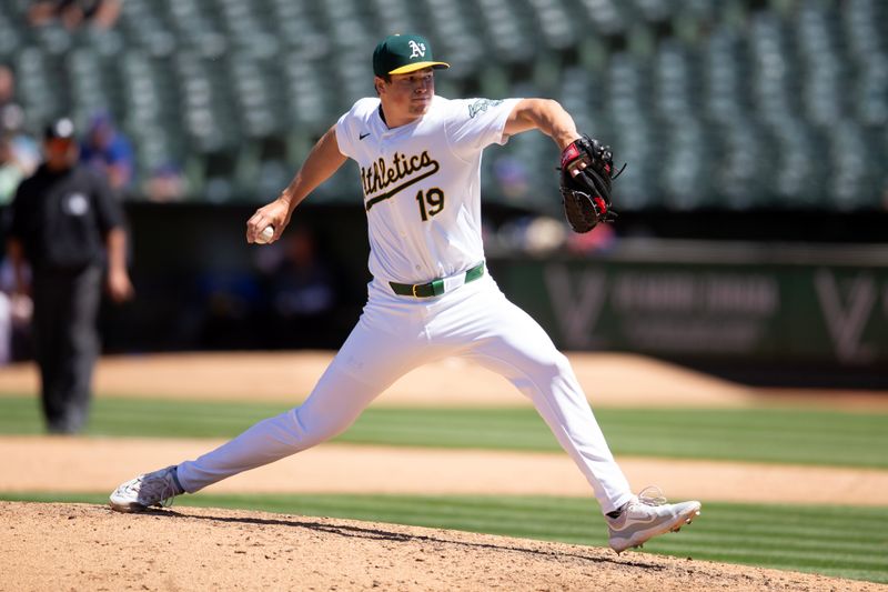 May 8, 2024; Oakland, California, USA; Oakland Athletics pitcher Mason Miller (19) delivers a pitch against the Texas Rangers during the eighth inning at Oakland-Alameda County Coliseum. Mandatory Credit: D. Ross Cameron-USA TODAY Sports