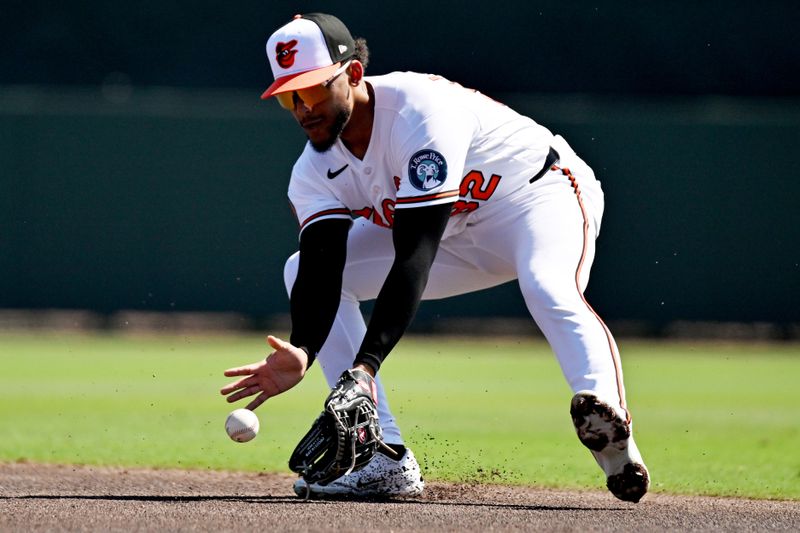 Feb 20, 2026; Sarasota, Florida, USA; Baltimore Orioles second baseman Jeremiah Jackson (82) fields a ground ball in the first inning against the New York Yankees during spring training at Ed Smith Stadium. Mandatory Credit: Jonathan Dyer-Imagn Images