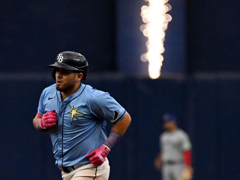 Sep 22, 2024; St. Petersburg, Florida, USA; Tampa Bay Rays first baseman Jonathan Aranda (62) rounds the bases after hitting a two run home run in the sixth inning against the Toronto Blue Jays at Tropicana Field. Mandatory Credit: Jonathan Dyer-Imagn Images