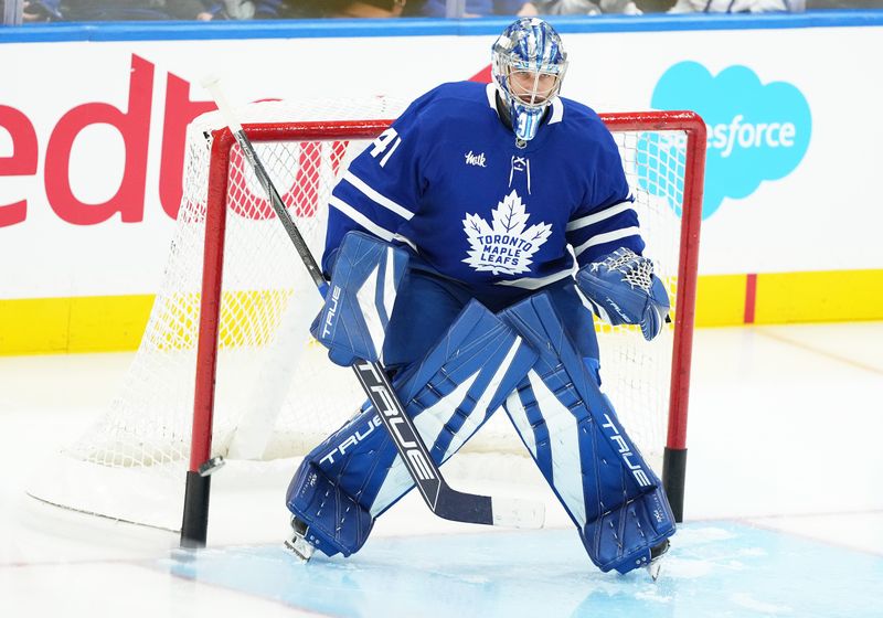 Oct 12, 2024; Toronto, Ontario, CAN; Toronto Maple Leafs goaltender Anthony Stolarz (41) takes pucks during the warmup before a game against the Pittsburgh Penguins at Scotiabank Arena. Mandatory Credit: Nick Turchiaro-Imagn Images