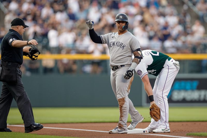 Jul 15, 2023; Denver, Colorado, USA; New York Yankees second baseman Gleyber Torres (25) gestures from third on a triple in the first inning against the Colorado Rockies at Coors Field. Mandatory Credit: Isaiah J. Downing-USA TODAY Sports