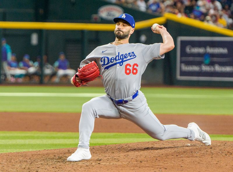 Sep 25, 2025; Phoenix, Arizona, USA; Los Angeles Dodgers pitcher Tanner Scott (66) on the mound to pitch in the seventh at Chase Field. Mandatory Credit: Allan Henry-Imagn Images