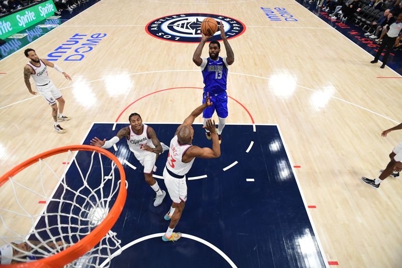 INGLEWOOD, CA - OCTOBER 14: Naji Marshall #13 of the Dallas Mavericks shoots the ball during the game against the LA Clippers during a NBA Preseason game on October 14, 2024 at the Intuit Dome in Inglewood, California. NOTE TO USER: User expressly acknowledges and agrees that, by downloading and/or using this Photograph, user is consenting to the terms and conditions of the Getty Images License Agreement. Mandatory Copyright Notice: Copyright 2024 NBAE (Photo by Adam Pantozzi/NBAE via Getty Images)