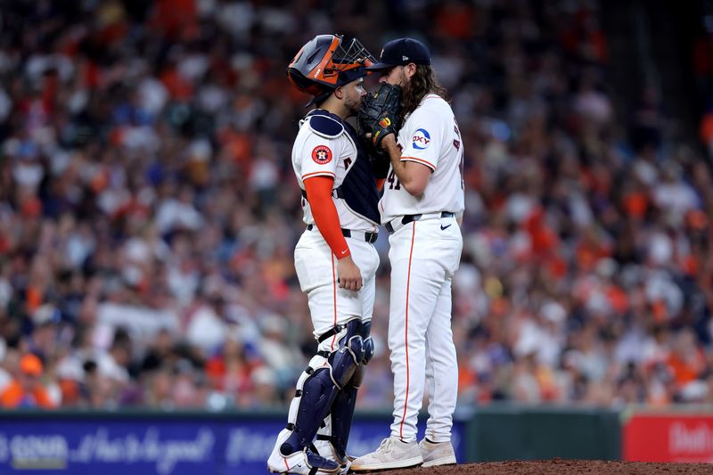 Jul 13, 2024; Houston, Texas, USA; Houston Astros designated hitter Yainer Diaz (21) talks with Houston Astros starting pitcher Spencer Arrighetti (41) during the sixth inning against the Texas Rangers at Minute Maid Park. Mandatory Credit: Erik Williams-USA TODAY Sports