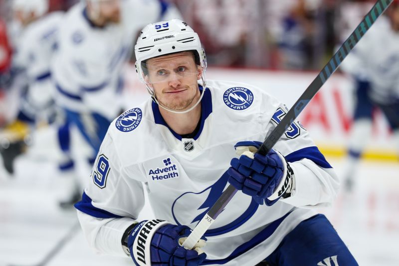 Apr 26, 2025; Sunrise, Florida, USA; Tampa Bay Lightning center Jake Guentzel (59) warms up before a game game three of the first round of the 2025 Stanley Cup Playoffs against the Florida Panthers at Amerant Bank Arena. Mandatory Credit: Nathan Ray Seebeck-Imagn Images