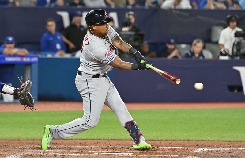 Aug 26, 2023; Toronto, Ontario, CAN;  Cleveland Guardias designated hitter Jose Ramiriez (11) reaches base on an error by Toronto Blue Jays third baseman Matt Chapman (not pictured) in the sixth inning at Rogers Centre. Mandatory Credit: Dan Hamilton-USA TODAY Sports