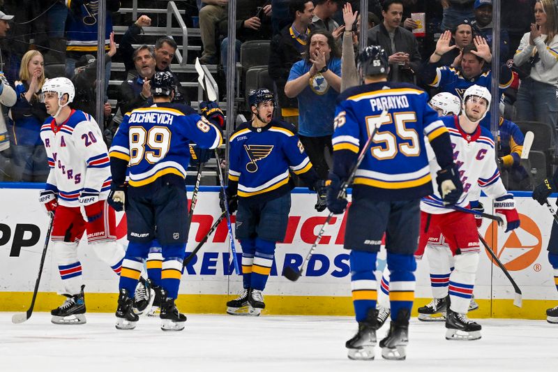 Jan 11, 2024; St. Louis, Missouri, USA;  St. Louis Blues center Jordan Kyrou (25) reacts after scoring against the New York Rangers during the first period at Enterprise Center. Mandatory Credit: Jeff Curry-USA TODAY Sports