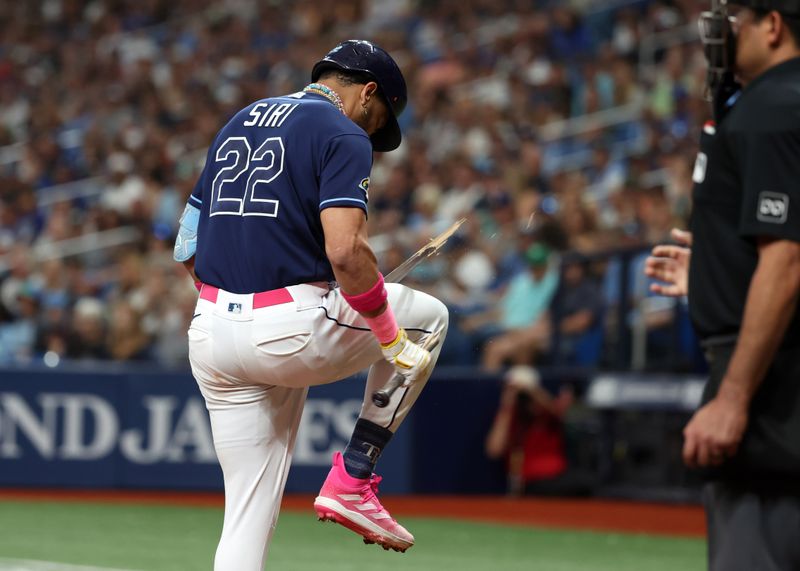 May 27, 2023; St. Petersburg, Florida, USA;  Tampa Bay Rays center fielder Jose Siri (22) breaks his bat after striking out against the Los Angeles Dodgers during the ninth inning at Tropicana Field. Mandatory Credit: Kim Klement-USA TODAY Sports