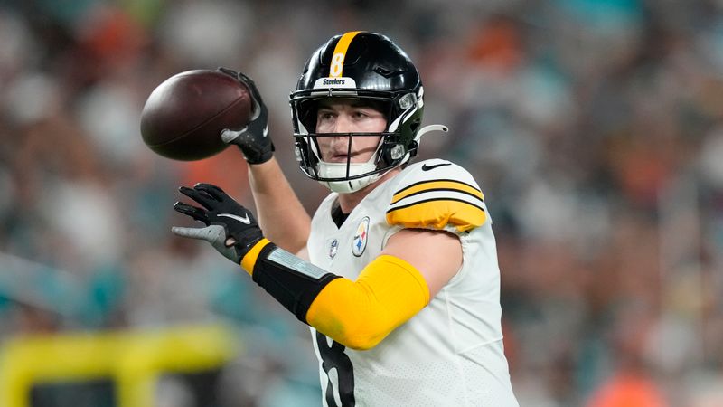 Pittsburgh Steelers quarterback Kenny Pickett (8) aims a pass during the first half of an NFL football game against the Miami Dolphins, Sunday, Oct. 23, 2022, in Miami Gardens, Fla. (AP Photo/Rebecca Blackwell)