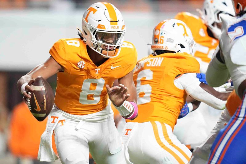 Oct 12, 2024; Knoxville, Tennessee, USA; Tennessee Volunteers quarterback Nico Iamaleava (8) scrambles with the ball against the Florida Gators at Neyland Stadium. Mandatory Credit: Brianna Paciorka/USA TODAY Network via Imagn Images