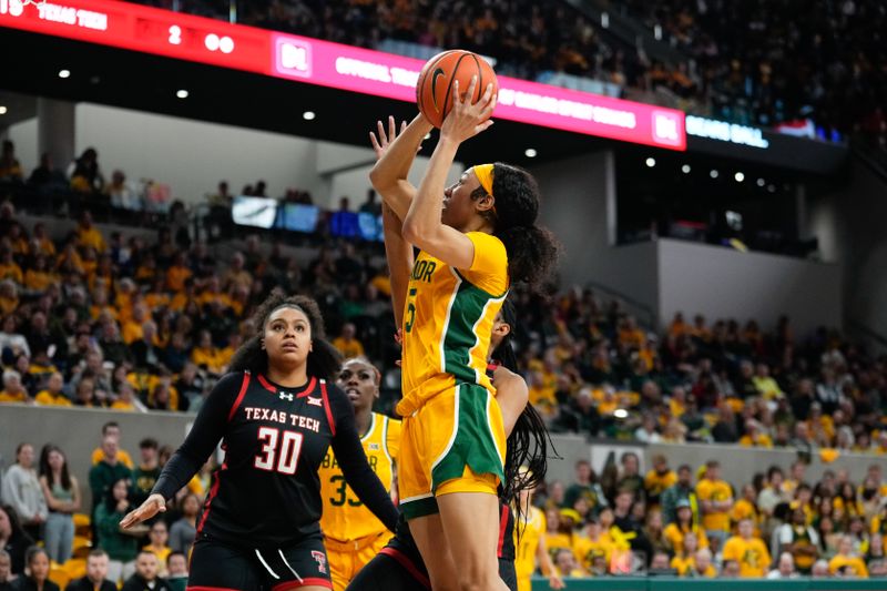 Feb 18, 2024; Waco, Texas, USA;  Baylor Lady Bears guard Darianna Littlepage-Buggs (5) scores a basket against the Texas Tech Red Raiders during the second half at Paul and Alejandra Foster Pavilion. Mandatory Credit: Chris Jones-USA TODAY Sports