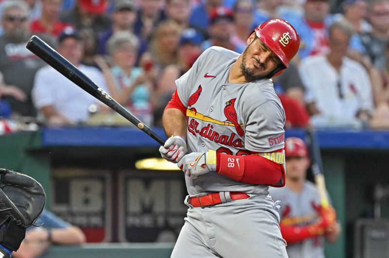 Aug 12, 2023; Kansas City, Missouri, USA;  St. Louis Cardinals third baseman Nolan Arenado (28) reacts after getting hit in the back with a pitch in the seventh inning against the Kansas City Royals at Kauffman Stadium. Mandatory Credit: Peter Aiken-USA TODAY Sports