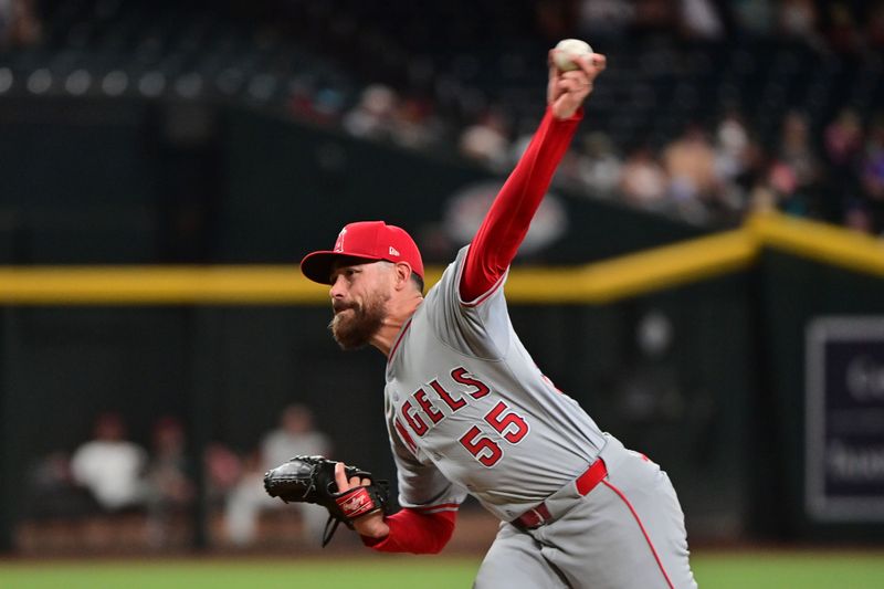 Jun 12, 2024; Phoenix, Arizona, USA; Los Angeles Angels pitcher Matt Moore (55) throws in the ninth inning against the Arizona Diamondbacks at Chase Field. Mandatory Credit: Matt Kartozian-USA TODAY Sports