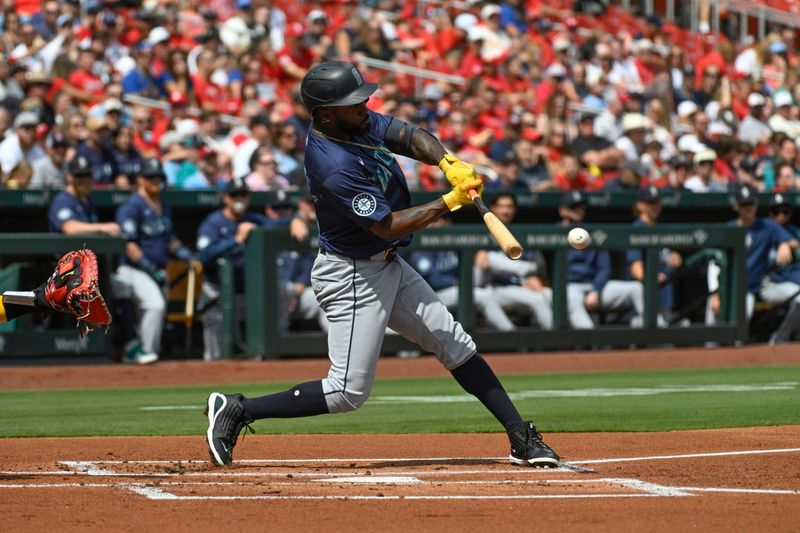 Sep 8, 2024; St. Louis, Missouri, USA; Seattle Mariners left fielder Randy Arozarena (56) hits a single against the St. Louis Cardinals during the first inning at Busch Stadium. Mandatory Credit: Jeff Le-Imagn Images