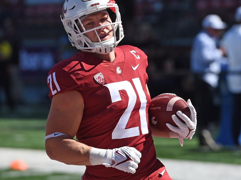 Sep 11, 2021; Pullman, Washington, USA; Washington State Cougars running back Max Borghi (21) warms up before a game against the Portland State Vikings at Gesa Field at Martin Stadium. Mandatory Credit: James Snook-USA TODAY Sports