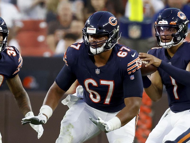 Chicago Bears center Sam Mustipher (67) looks to make a block during an NFL preseason football game against the Cleveland Browns, Saturday Aug. 27, 2022, in Cleveland. (AP Photo/Kirk Irwin)