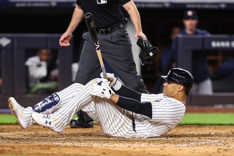 May 7, 2024; Bronx, New York, USA;  New York Yankees right fielder Juan Soto (22) reacts after getting hit by the pitch in the seventh inning against the Houston Astros at Yankee Stadium. Mandatory Credit: Wendell Cruz-USA TODAY Sports