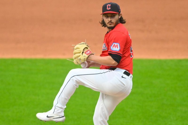 Jul 3, 2024; Cleveland, Ohio, USA; Cleveland Guardians relief pitcher Eli Morgan (49) delivers a pitch in the fifth inning against the Chicago White Sox at Progressive Field. Mandatory Credit: David Richard-USA TODAY Sports