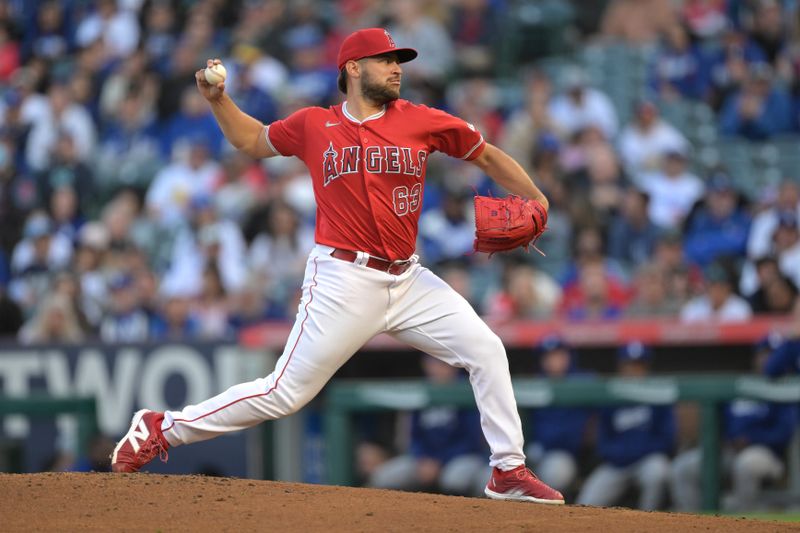 Mar 26, 2024; Anaheim, California, USA;  Los Angeles Angels starting pitcher Chase Silseth (63) throws to the plate in the second inning against the Los Angeles Dodgers at Angel Stadium. Mandatory Credit: Jayne Kamin-Oncea-USA TODAY Sports