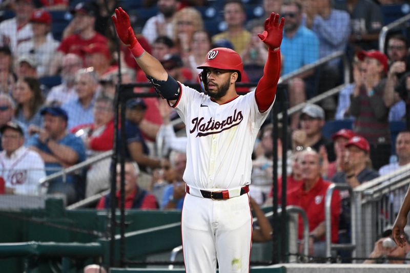 May 20, 2024; Washington, District of Columbia, USA; Washington Nationals second baseman Luis García Jr. (2) gives the signal to stop against the Minnesota Twins during the fifth inning at Nationals Park. Mandatory Credit: Rafael Suanes-USA TODAY Sports