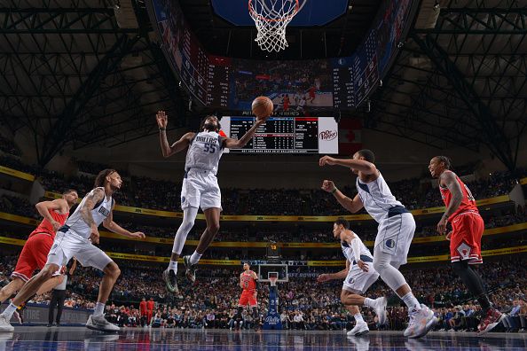 DALLAS, TX - NOVEMBER 1: Derrick Jones Jr. #55 of the Dallas Mavericks grabs the rebound during the game against the Chicago Bulls on November 1, 2023 at the American Airlines Center in Dallas, Texas. NOTE TO USER: User expressly acknowledges and agrees that, by downloading and or using this photograph, User is consenting to the terms and conditions of the Getty Images License Agreement. Mandatory Copyright Notice: Copyright 2023 NBAE (Photo by Glenn James/NBAE via Getty Images)