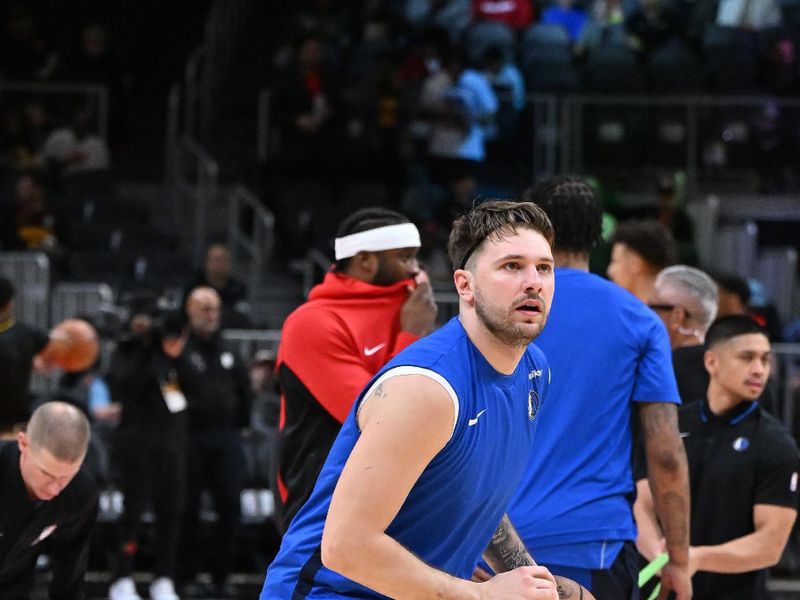 ATLANTA, GEORGIA - JANUARY 26: Luka Doncic #77 of the Dallas Mavericks warms up before the game against the Atlanta Hawks at State Farm Arena on January 26, 2024 in Atlanta, Georgia. NOTE TO USER: User expressly acknowledges and agrees that, by downloading and or using this photograph, User is consenting to the terms and conditions of the Getty Images License Agreement. (Photo by Paras Griffin/Getty Images)