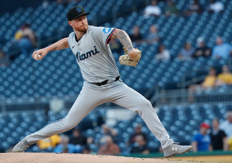 Sep 10, 2024; Pittsburgh, Pennsylvania, USA;  Miami Marlins starting pitcher Adam Oller (77) delivers a pitch against the Pittsburgh Pirates during the first inning at PNC Park. Mandatory Credit: Charles LeClaire-Imagn Images