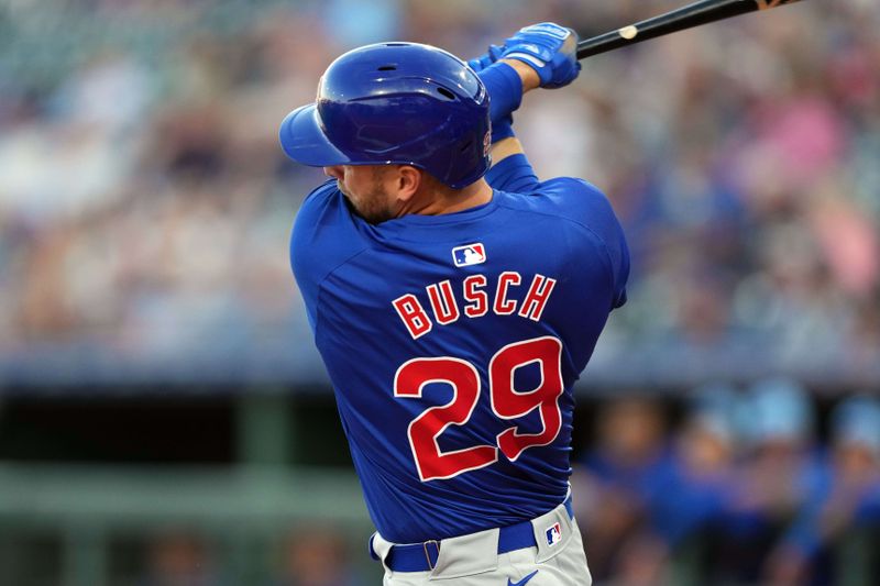 Mar 5, 2024; Surprise, Arizona, USA; Chicago Cubs designated hitter Michael Busch (29) bats against the Kansas City Royals during the first inning at Surprise Stadium. Mandatory Credit: Joe Camporeale-USA TODAY Sports