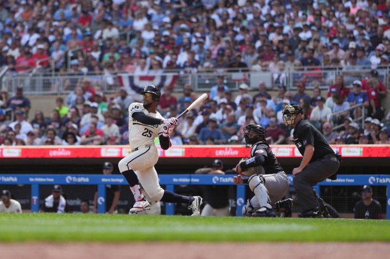 Aug 11, 2024; Minneapolis, Minnesota, USA; Minnesota Twins center fielder Byron Buxton (25) hits into a fielder’s choice during the sixth inning against the Cleveland Guardians at Target Field. Mandatory Credit: Jordan Johnson-USA TODAY Sports