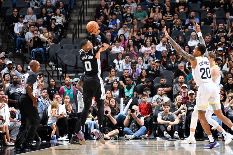 SAN ANTONIO, TX - NOVEMBER 9: Keldon Johnson #0 of the San Antonio Spurs shoots a three point basket during the game against the Utah Jazz on November 9, 2024 at the Frost Bank Center in San Antonio, Texas. NOTE TO USER: User expressly acknowledges and agrees that, by downloading and or using this photograph, user is consenting to the terms and conditions of the Getty Images License Agreement. Mandatory Copyright Notice: Copyright 2024 NBAE (Photos by Logan Riely/NBAE via Getty Images)