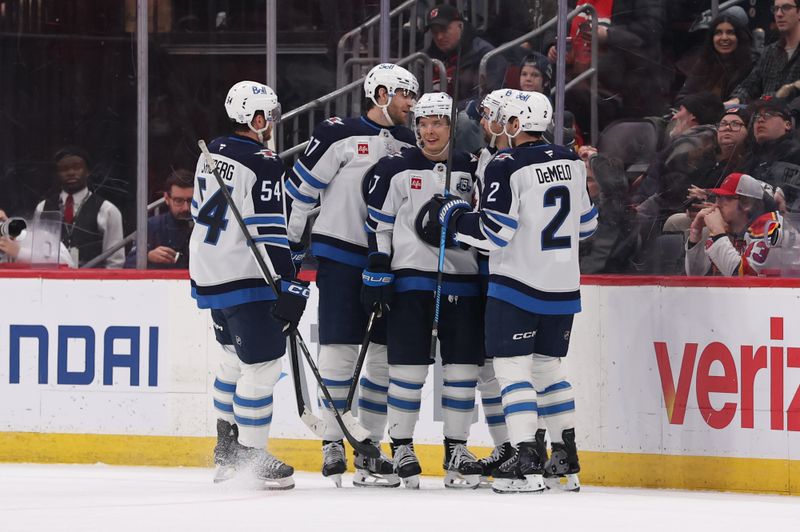 Jan 27, 2026; Newark, New Jersey, USA; Winnipeg Jets right wing Nino Niederreiter (62) celebrates his goal against the New Jersey Devils during the second period at Prudential Center. Mandatory Credit: Ed Mulholland-Imagn Images