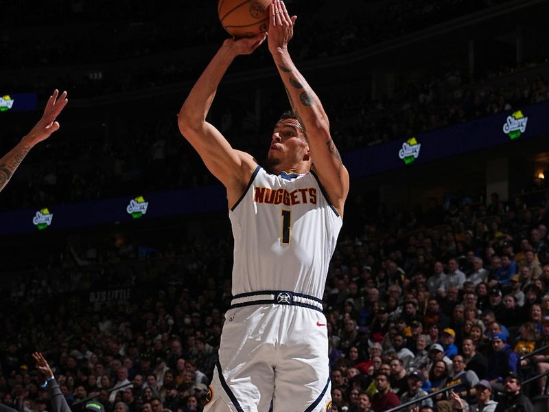 DENVER, CO - FEBRUARY 28: Michael Porter Jr. #1 of the Denver Nuggets three point basket during the game against the Sacramento Kings on February 28, 2024 at the Ball Arena in Denver, Colorado. NOTE TO USER: User expressly acknowledges and agrees that, by downloading and/or using this Photograph, user is consenting to the terms and conditions of the Getty Images License Agreement. Mandatory Copyright Notice: Copyright 2024 NBAE (Photo by Garrett Ellwood/NBAE via Getty Images)