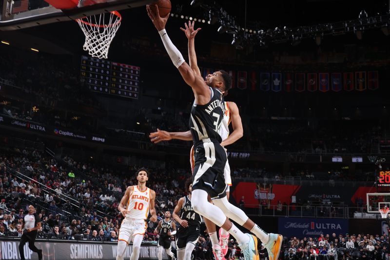 LAS VEGAS, NV - DECEMBER 14: Giannis Antetokounmpo #34 of the Milwaukee Bucks drives to the basket during the game against the Atlanta Hawks during the Emirates NBA Cup Semifinal game on December 14, 2024 at T-Mobile Arena in Las Vegas, Nevada. NOTE TO USER: User expressly acknowledges and agrees that, by downloading and/or using this Photograph, user is consenting to the terms and conditions of the Getty Images License Agreement. Mandatory Copyright Notice: Copyright 2024 NBAE (Photo by Nathaniel S. Butler/NBAE via Getty Images)
