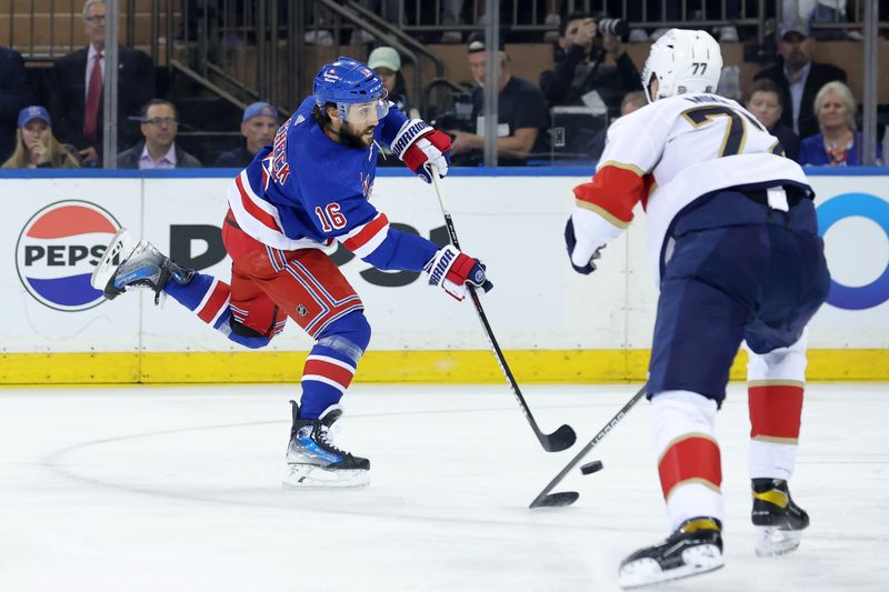 May 22, 2024; New York, New York, USA; New York Rangers center Vincent Trocheck (16) takes a shot against Florida Panthers defenseman Niko Mikkola (77) during the first period of game one of the Eastern Conference Final of the 2024 Stanley Cup Playoffs at Madison Square Garden. Mandatory Credit: Brad Penner-USA TODAY Sports