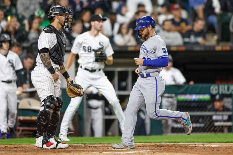 Sep 13, 2023; Chicago, Illinois, USA; Kansas City Royals center fielder Kyle Isbel (28) scores against the Chicago White Sox during the seventh inning at Guaranteed Rate Field. Mandatory Credit: Kamil Krzaczynski-USA TODAY Sports